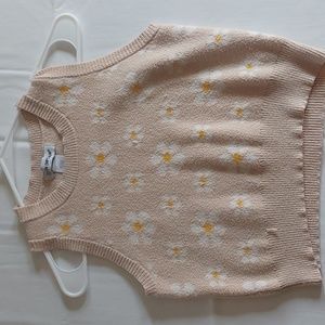 Cropped cotton cream extra large sweater vest with flowers.